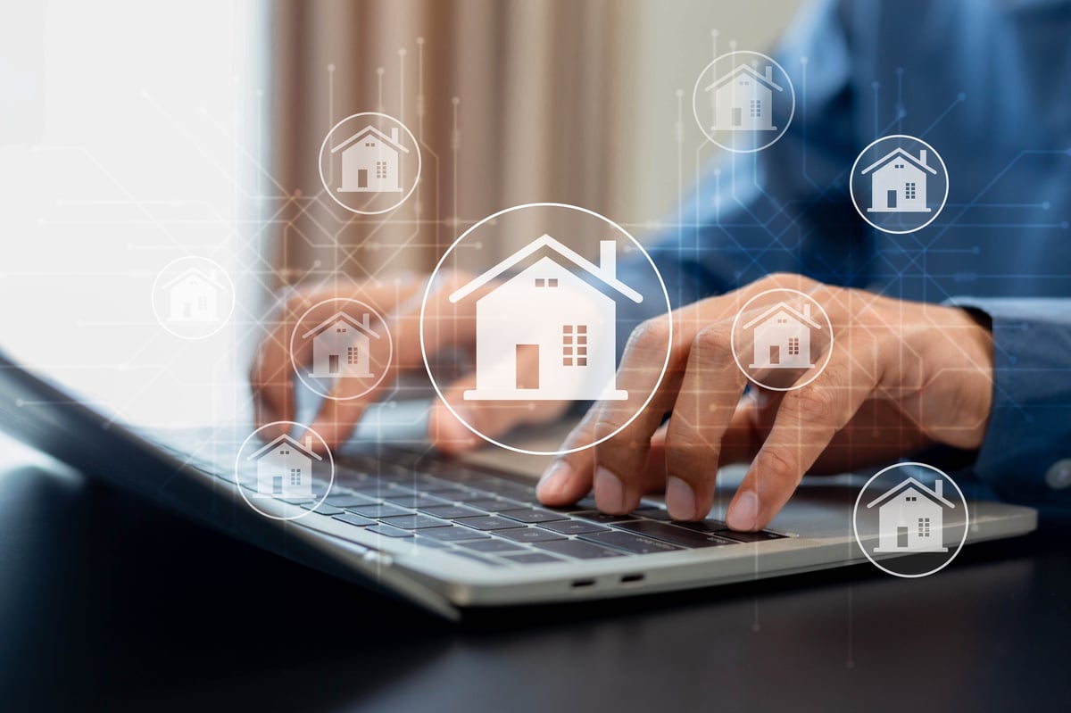 Real estate investment concept . Businessman use laptop with house icon for analyzing mortgage loan home and insurance real property mortgage. business real estate.
