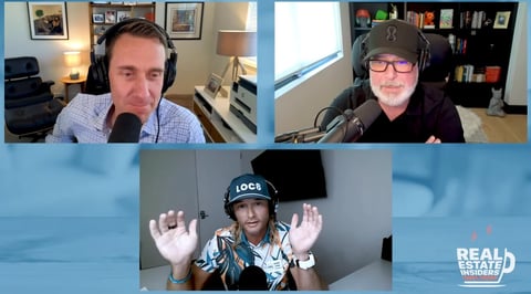 Three people in a video call grid: two men in home offices at top, one person wearing a helmet and goggles in center bottom